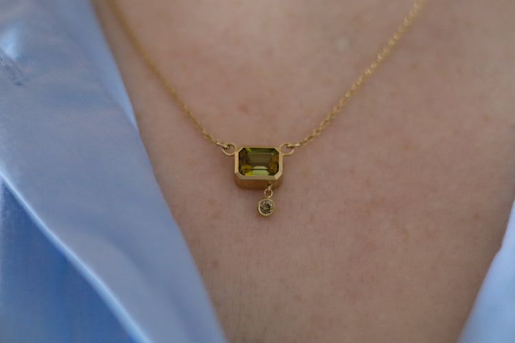 octagon tourmaline olive green in 18ct yellow gold with champagne diamond drop in line necklace on model