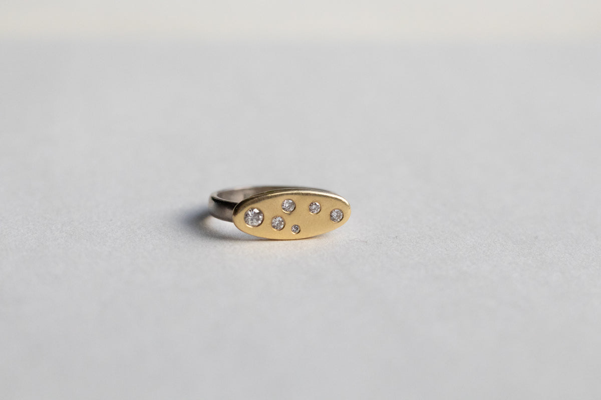 diamond engagement ring, bold modern style, bezel set, brushed gold