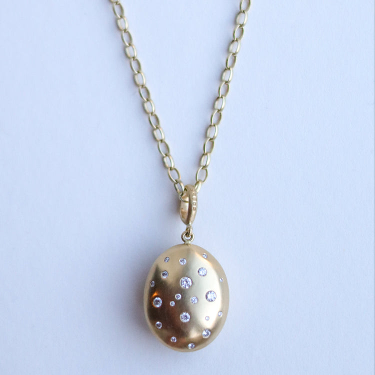 18ct yellow gold speckled diamond set brushed gold egg shaped oval domed pendant on belcher chain paper shot