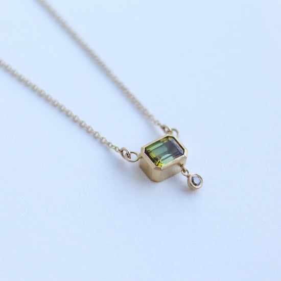 goldfinch jewellery octagon tourmaline olive green in 18ct yellow gold with champagne diamond drop in line necklace front 