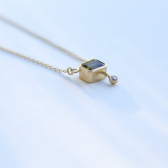 octagon tourmaline olive green in 18ct yellow gold with champagne diamond drop in line necklace