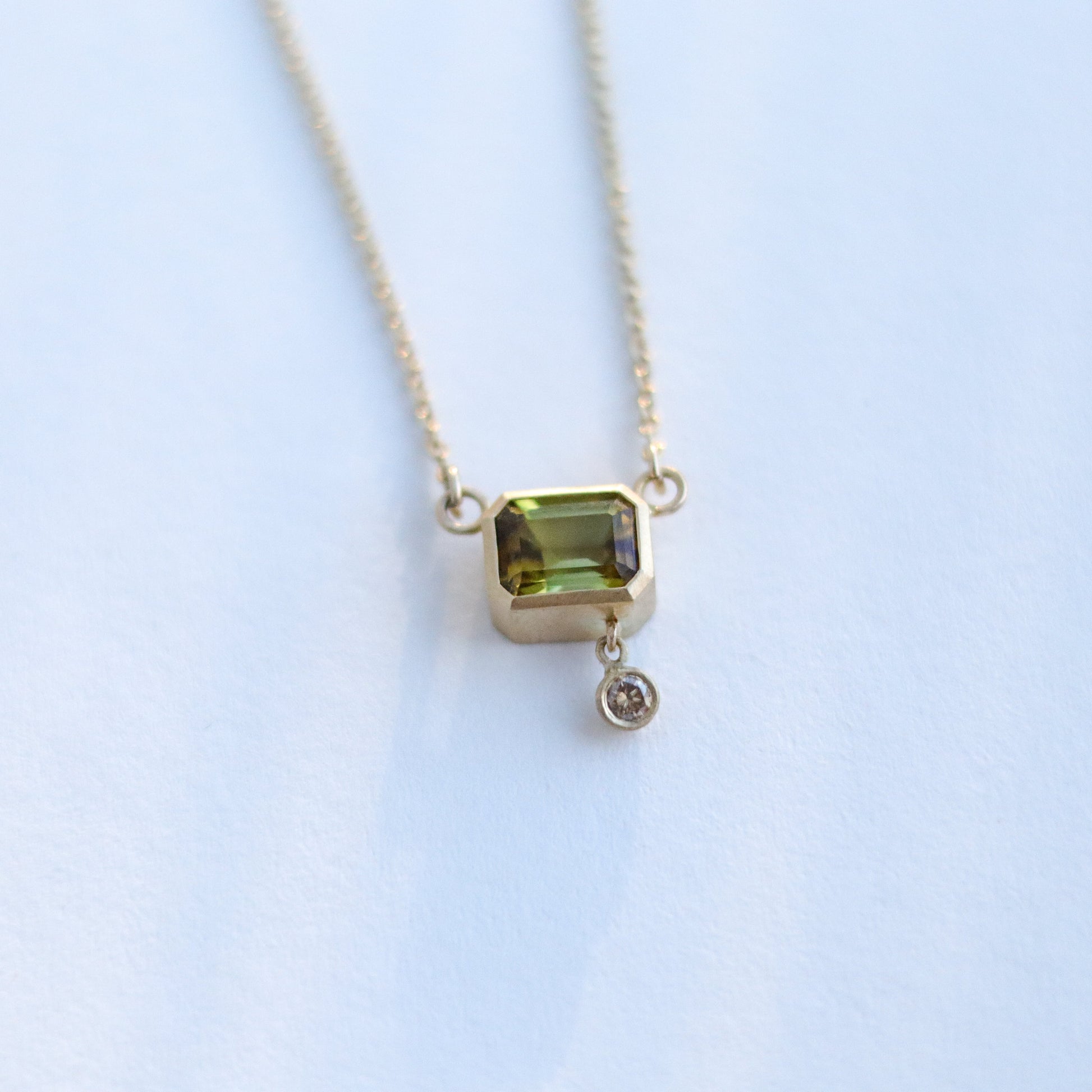 octagon tourmaline olive green in 18ct yellow gold with champagne diamond drop in line necklace top down